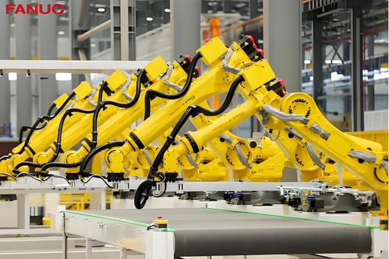 FANUC Laser Cutting Cell with Automatic Loading/Unloading and Turn Table for Mass Production of 3D Metal Workpieces in Automotive Industry